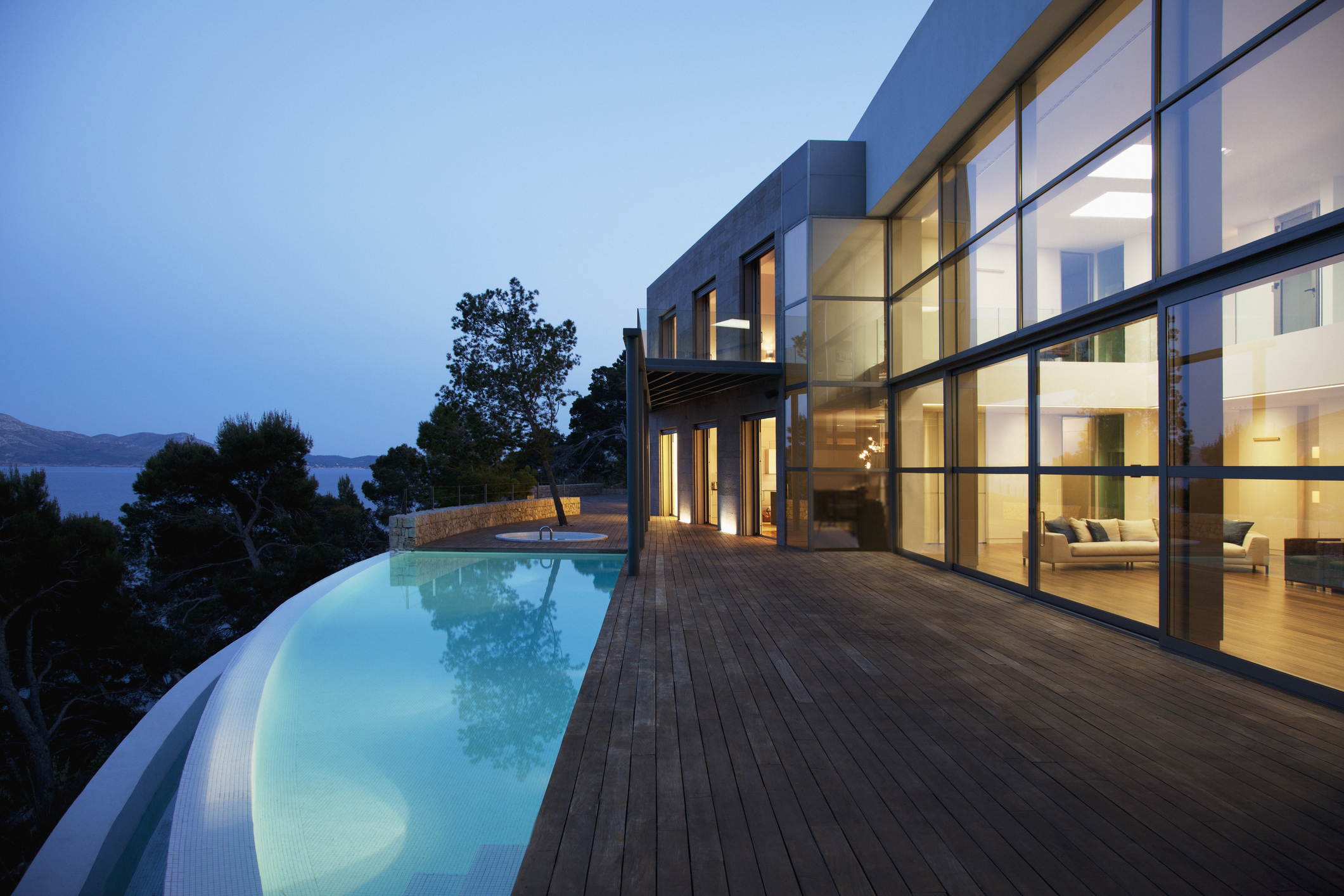 Modern waterfront house with infinity pool